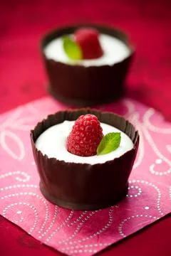 Chocolate mousse with raspberry Stock Photos