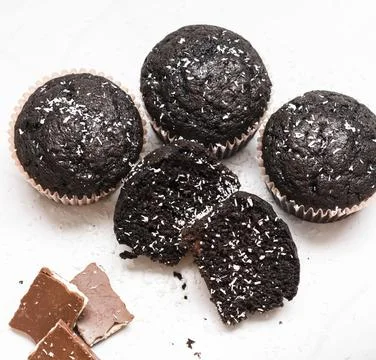 Chocolate muffins on a gray background Stock Photos