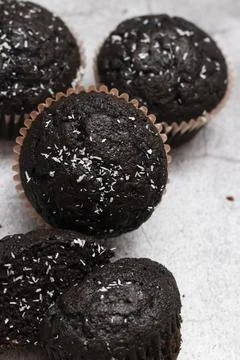 Chocolate muffins on a gray background Stock Photos