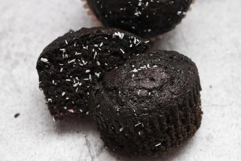 Chocolate muffins on a gray background Stock Photos