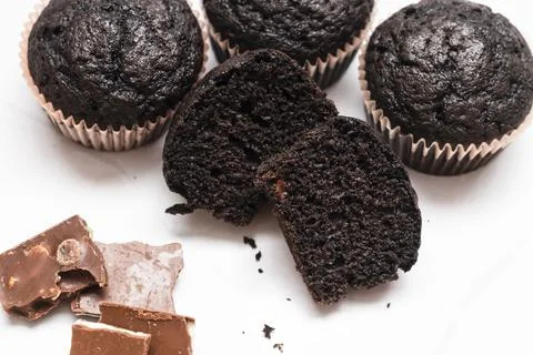 Chocolate muffins on a gray background Stock Photos