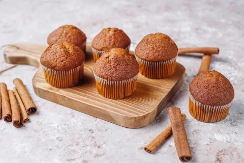 Chocolate muffins on light brown background ,Selective Focus. Stock Photos