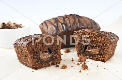 Chocolate nougat cakes, whole and halved Stock Photos