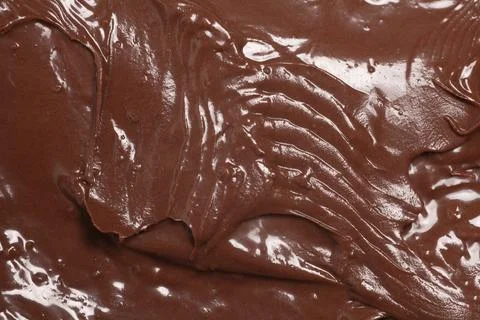 Chocolate nut paste as background, texture,macro. Фото