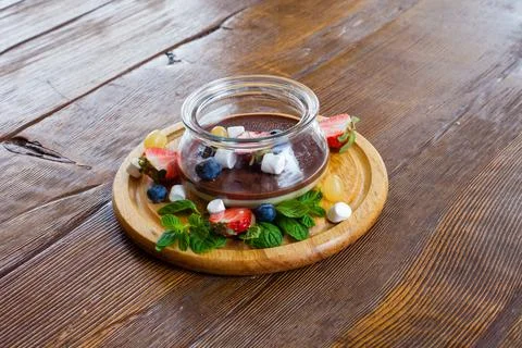Chocolate original serving dish on the table Stock Photos