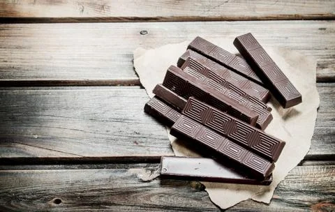 Chocolate on paper. Stock Photos