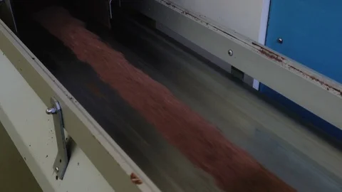 Chocolate paste moves along the conveyor. Production line for the production of Video stock 74204625