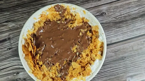 Chocolate paste sauce on top of Sweet Koshary recipe Stock Footage 273157248