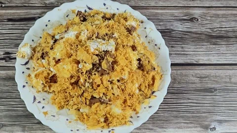 Chocolate paste sauce on top of Sweet Koshary recipe Stock Footage 273157265