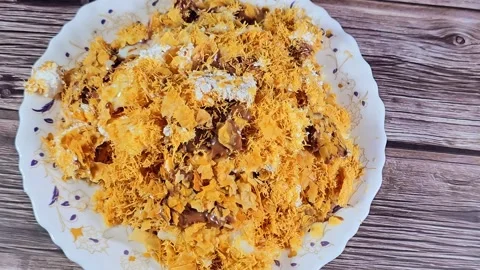 Chocolate paste sauce on top of Sweet Koshary recipe Stock Footage 273157403