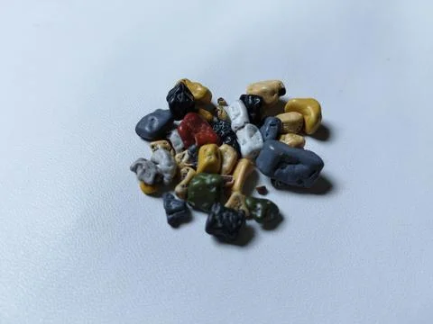 Chocolate pebbles are bite-sized chocolate snacks shaped like natural pebbles Stock Photos