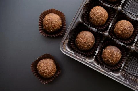 Chocolate petit four sweets in wrapper Stock Photos