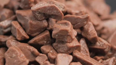 Chocolate pieces on a table Stock Footage 343807007