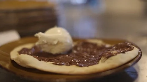Chocolate Pizza Dessert - Adding a Scoop of Ice Cream Stock Footage 77033797