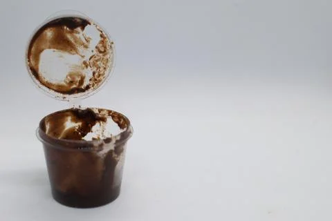 Chocolate in plastic cup container.White background Stock Photos