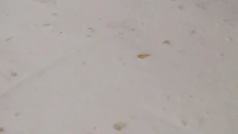 Chocolate is poured onto a cake Stock Footage 81505102