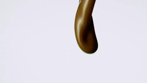 Chocolate pouring over flat background Stock Footage 149003786