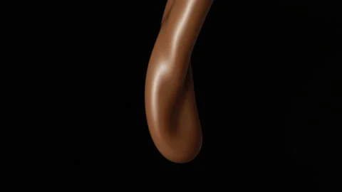 Chocolate pouring over flat background Stock Footage 149003816