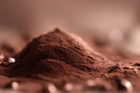 Chocolate powder with depth of field Stock Photos