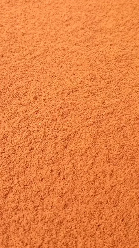 Chocolate Powder Falling on Cocoa Powder Background, vertical clip Stock Footage 340550741