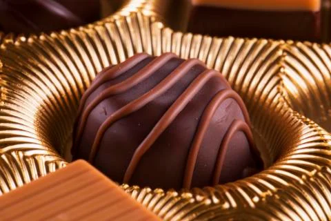 Chocolate praline in close up Stock Photos