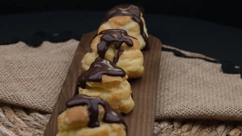 Chocolate profiterole rotate Stock Footage 260410022
