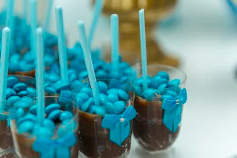 Chocolate pudding brown into cup plastic on white background. Stock Photos