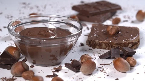 Chocolate Pudding, Chocolate Bar and Hazelnuts Stock Footage 110851087