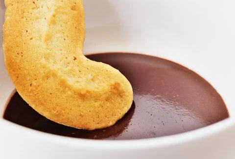 Chocolate pudding cup with cookie Stock Photos