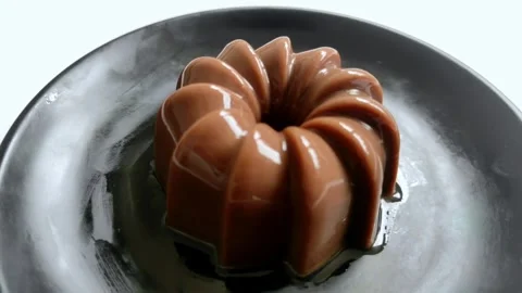 Chocolate Pudding Dessert Dish on a Black Plate Stock Footage 321640655