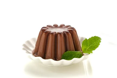 Chocolate pudding with mint leaf Stock Photos