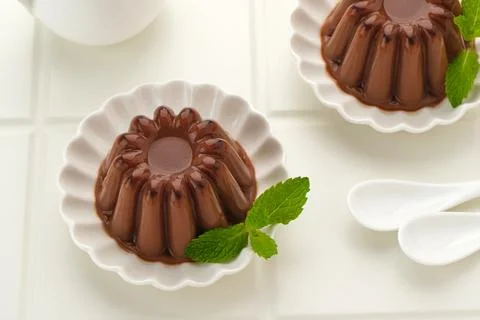 Chocolate pudding with mint leaf Stock Photos