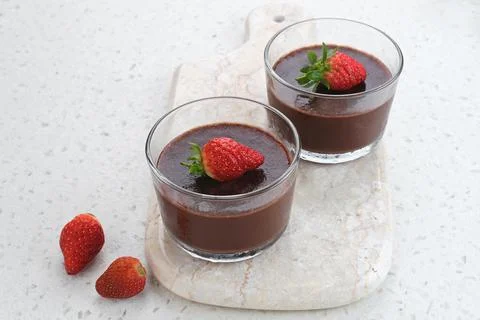 Chocolate pudding with strawberries  Stock Photos