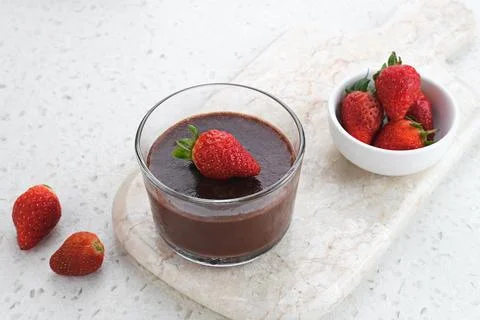 Chocolate pudding with strawberries  Stock Photos