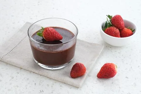 Chocolate pudding with strawberries  Stock Photos