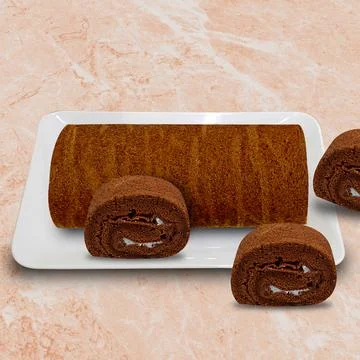 Chocolate rolled sponge cake on a white plate Stock Photos