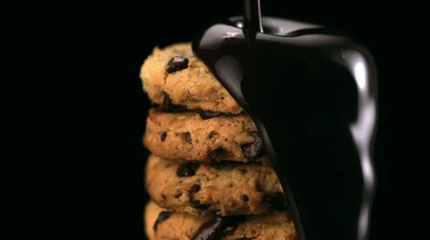 Chocolate sauce on cookie, Slow Motion Video stock 12460339