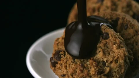 Chocolate sauce on cookie, Slow Motion Stock Footage 12460419
