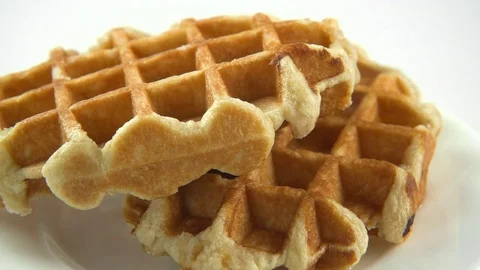 Chocolate sauce flows on waffles Stock Footage 83042489