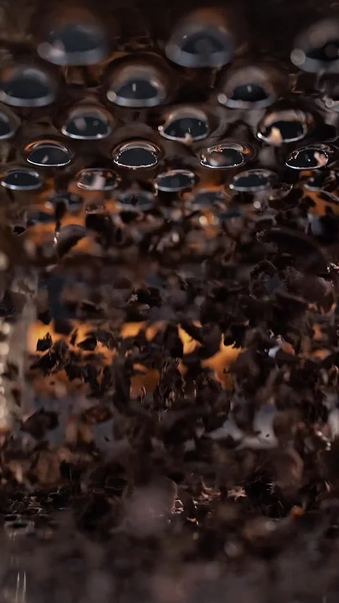 Chocolate shavings inside the grater fly around in slow motion. Stock Footage 281668700