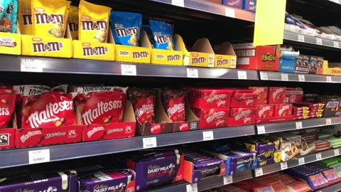 Chocolate shelf in store Stock Footage 174385125