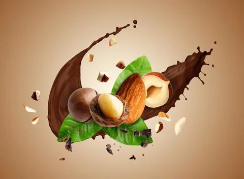 Chocolate splash with nuts on brown gradient background Stock Photos