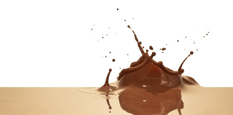 Chocolate splash Stock Photos