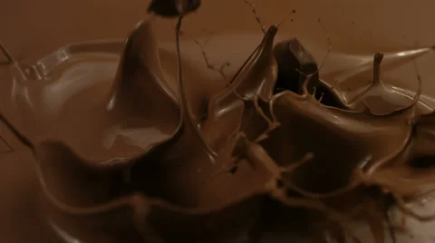 Chocolate splash, slow motion Stock Footage