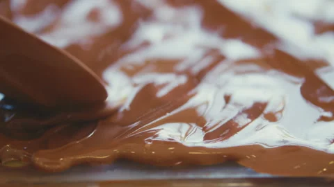 Chocolate spread around with spoon Stock Footage 274629655