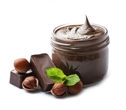 Chocolate spread with filbert nuts Stock Photos