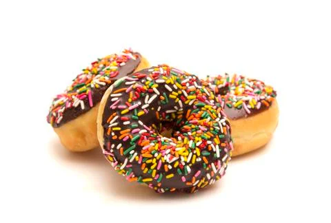 Chocolate Sprinkle Donuts on a White Background Stock Photos