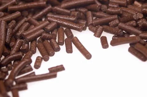 Chocolate sprinkles on white background. frame Stock Photos