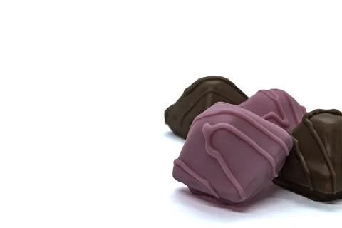 Chocolate square candy on a white background view from above isolate copy space Foto stock