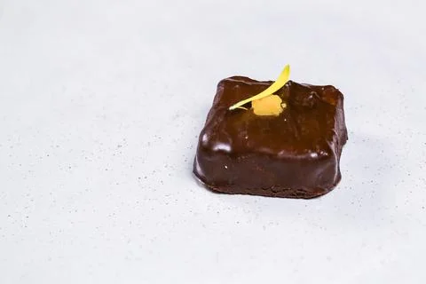 Chocolate Square on White Surface Stock Photos
